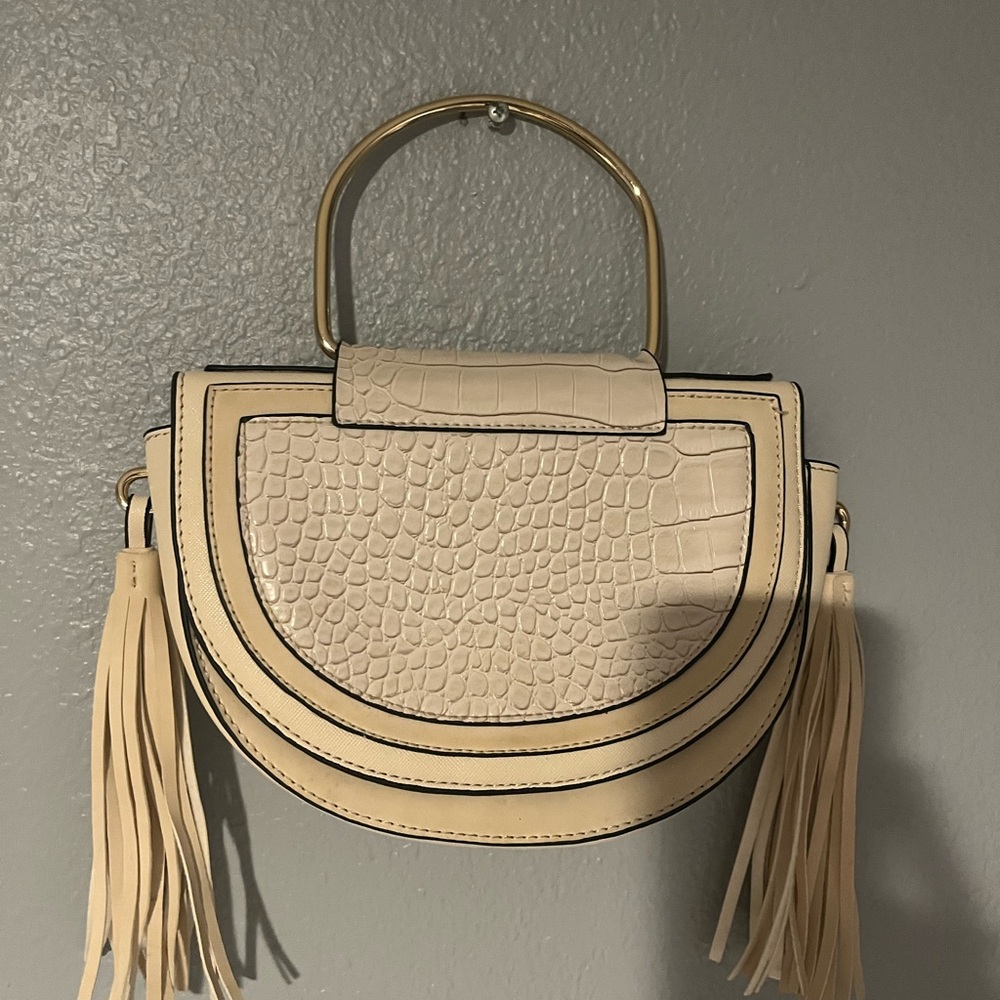 Cute faux leather cream cross body or hand bag!